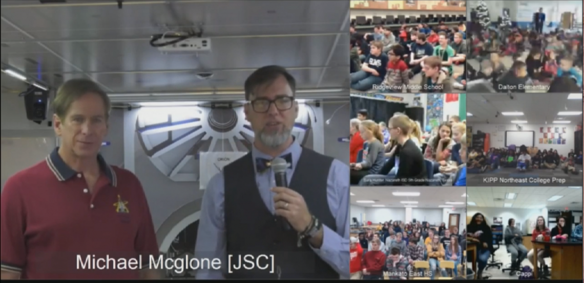 A split screenshot of Steven holding a mic standing next to Astronaut Michael Gernhardt who is wearing a red polo shirt. The other half of the screenshot is 6 screenshots of students in classrooms.