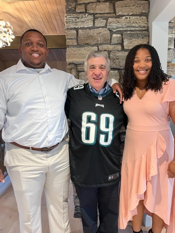 From left to right, Elijah Mason, David Blum, and Mason’s fiancé, MaKayla Kelby, at Blum’s house for dinner and football.