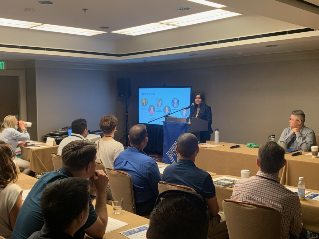 Sarah Samdin presenting in front of a group of people