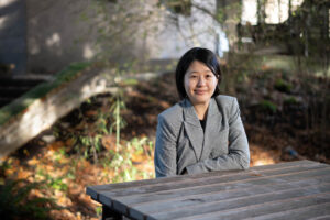 Karen Chen sitting at a picnic table